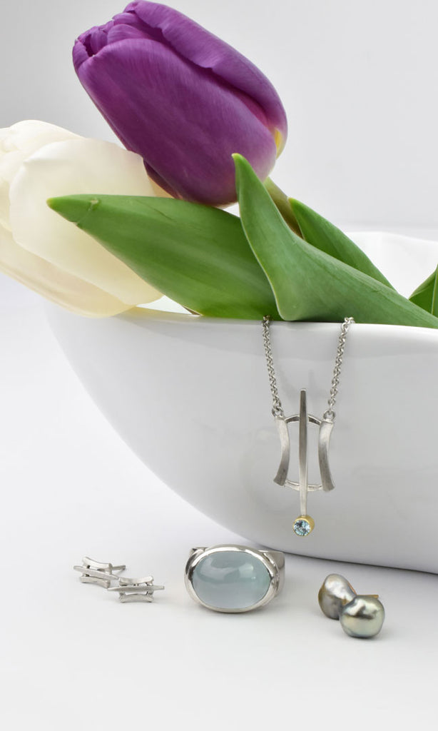 silver and gemstone earrings, rings, and necklaces from Nikki Lorenz Designs