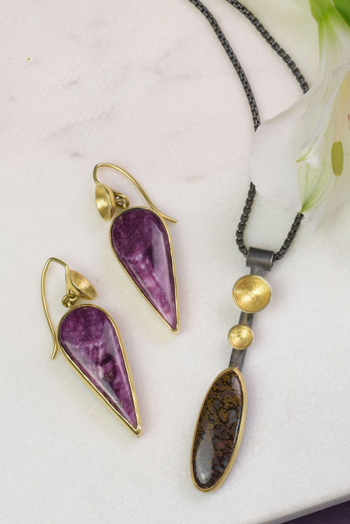 gold earrings with purple shell, oxidized silver and gold necklace with brown stone from Nikki Lorenz Designs