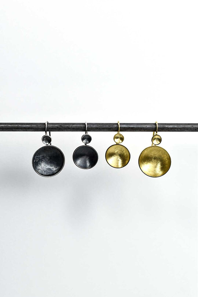 Earrings from the Bowl Collection in silver and gold