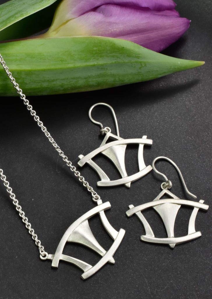 Art deco inspired silver earrings and necklace from Nikki Lorenz Deisgns