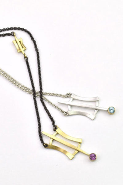 silver and gold necklaces with garnet and blue zircon from Nikki Lorenz Designs