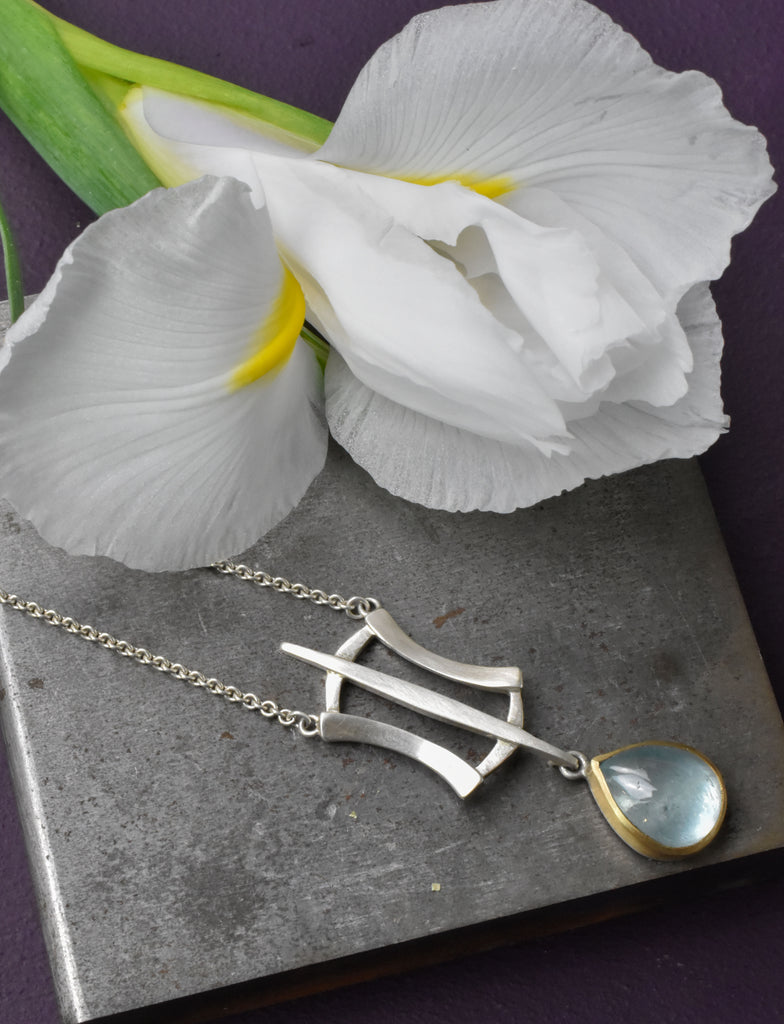 silver and gold aquamarine necklace from Nikki Lorenz Designs