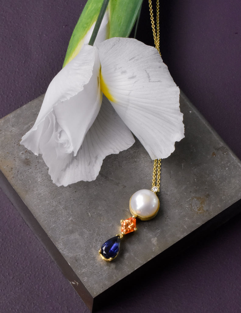 garnet, iolite, pearl and diamond pendant from Nikki Lorenz Designs