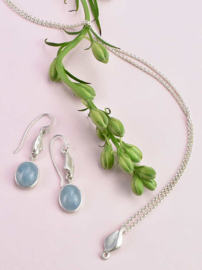 silver and aquamarine floral inspired jewelry from Nikki Lorenz Designs