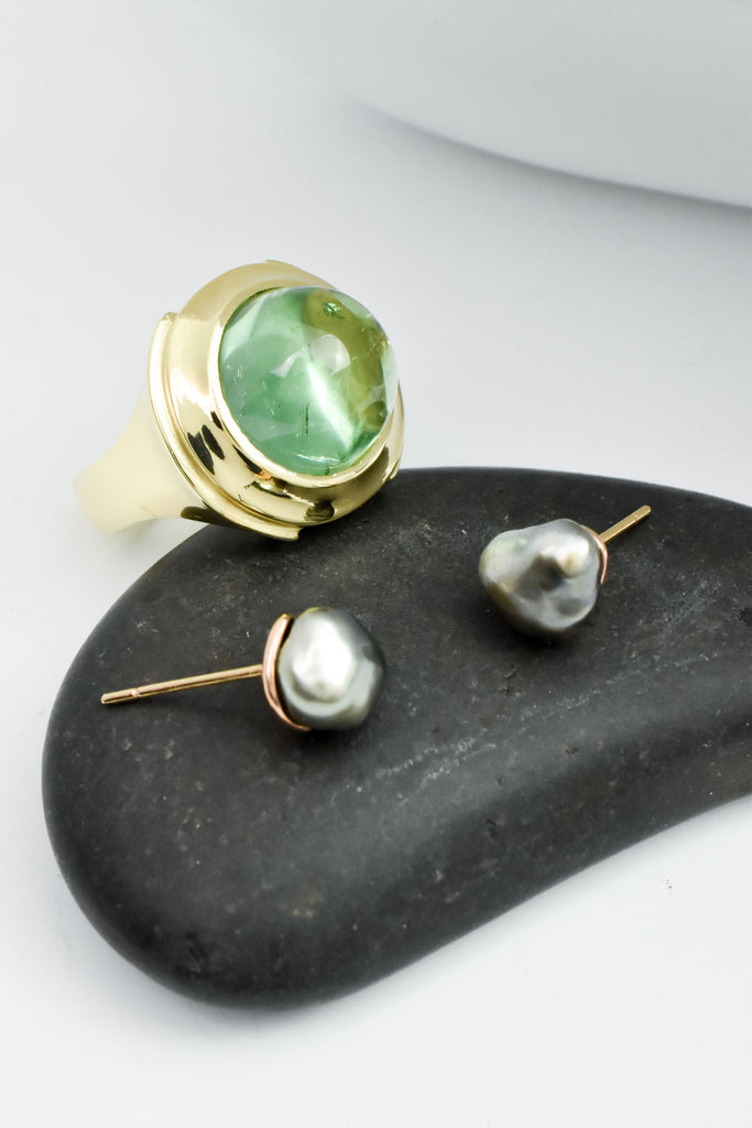 gold ring with green tourmaline and black pearl earrings from Nikki Lorenz Designs