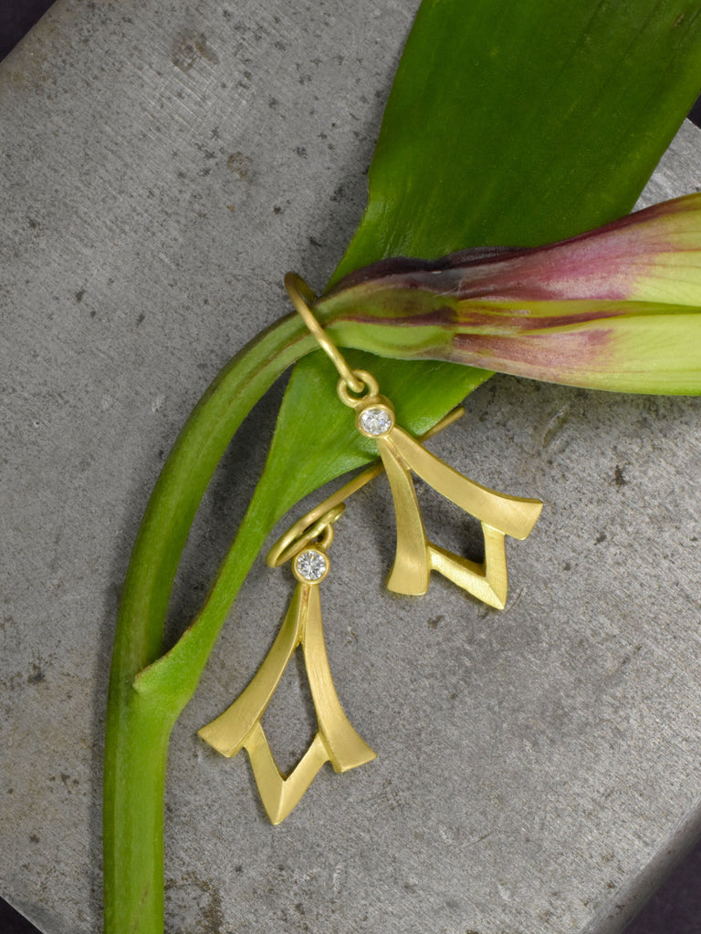 small gold and diamond dangle earrings with an art deco influence from Nikki Lorenz Design.